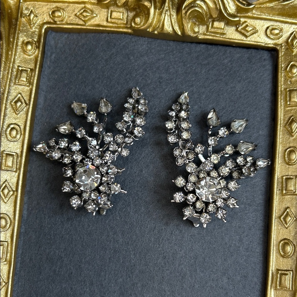 Vintage crystal climbers featuring sparkling stones in a starburst design